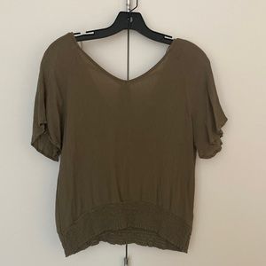 Cute olive green top. Never worn.